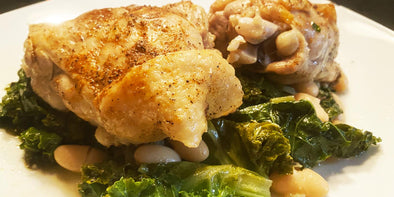 Braised Chicken Over Kale